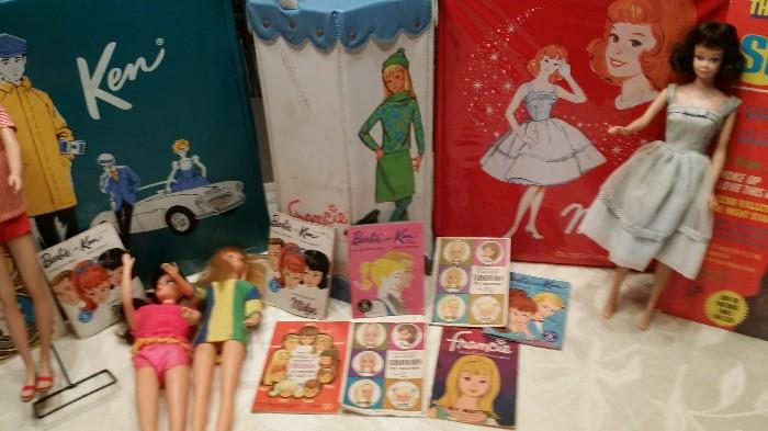 Early 60's Barbie, Midge, Francie, Ken and Barbie's baby sister Tutti all in original cloths and cases
