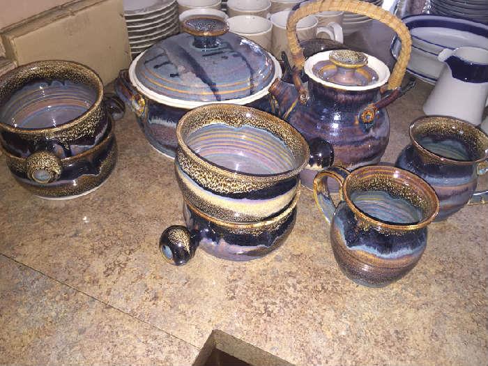 Pottery w/soup bowls,  casserole, teapot and 4 mugs