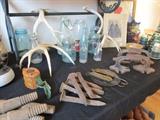 Cask corks, Rail road spikes, antlers, blue jars