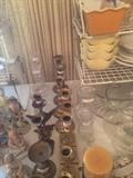Variety of candle holders, glassware, knick knacks, and Southern Living dishes
