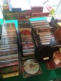 Many cassette tapes, CD's,  & videos