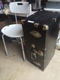 Shower chair and vintage trunk
