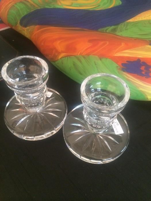 Colorful art glass vase (laying down) and Waterford candle holders from the Pat Prince estate