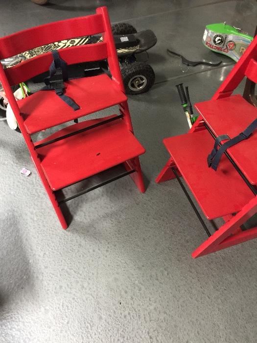 pair of red high chairs homeowner has twins!