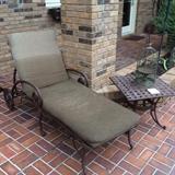 wrought iron lounge with occasional table
