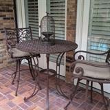 wrought iron bistro table with 2 chairs
