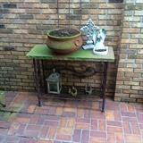 wrought iron base with stone top