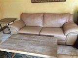 Leather love seat, pickled pine and chrome coffee table and two end tables