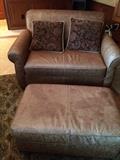 Leather (twin sized) pull out sleeper with matching ottoman