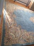one of two matching rugs