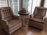 Comfy vintage rocker chairs and leather topped accent table