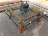 Beveled glass and wood cocktail table