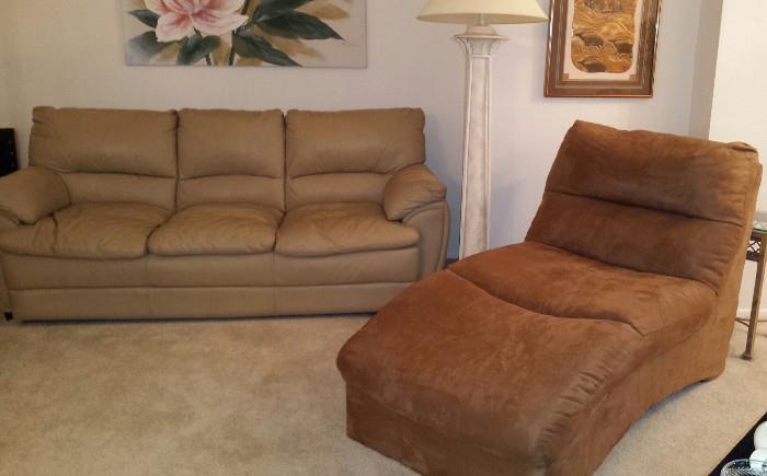 Leather sofa, ultrasuede chaise, painting signed by Marshall, plaster floor lamp, framed copper artwork