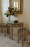 Sofa/console table, 2 accent tables and framed beveled mirror. Quattro foil design metal bases. Featured on top of the console/sofa table is a vintage hat made of pheasant feathers