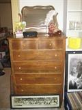 Antique dresser with attached swing mirror
