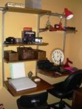 Elfa shelves, cameras, desk lamps, light box, baskets, task chair, desk chair, Audubon bird clock
