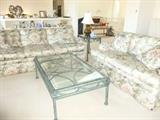 Ethan Allen loveseat and couch.  Glass and iron tables, brass light.