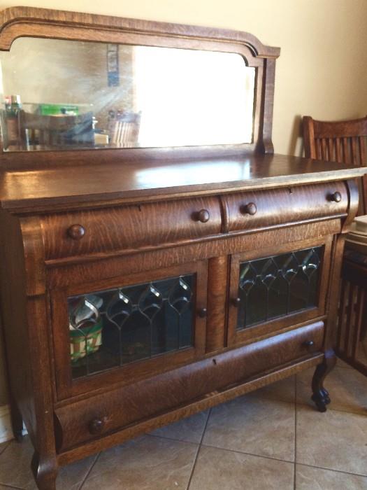 Antique sideboard with mirror and bevelled-glass-front doors