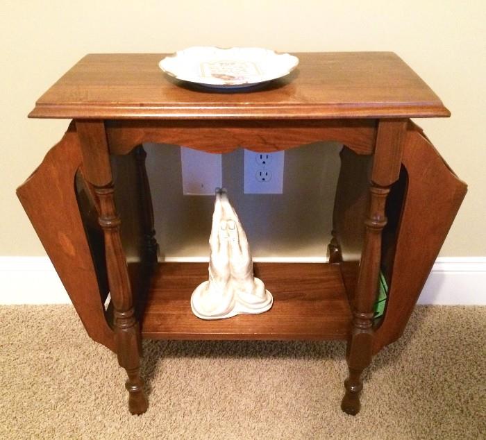 Beautiful antique side table with magazine pockets