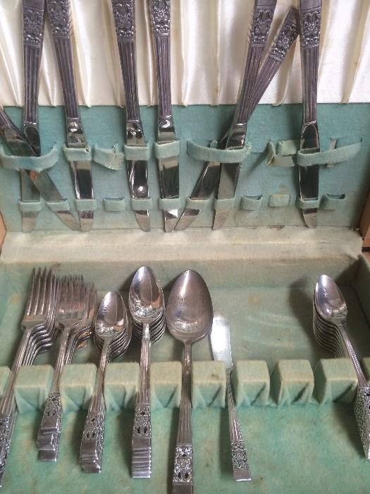 Another set of silverplate flatware, service for 8