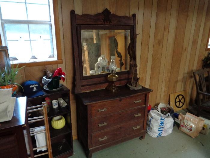 Antique primitive dresser with mirror .