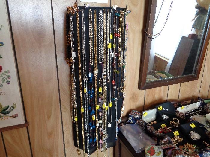 Collection of Necklaces and Pins .
