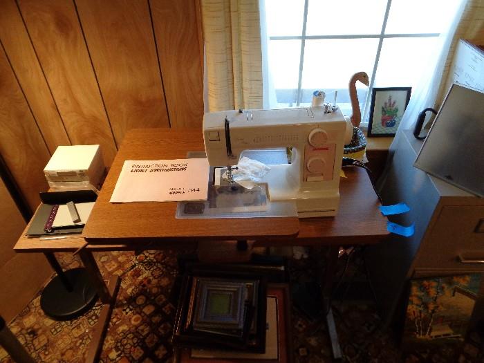 Nice Sewing Machine and Cabinet by Janome , has original owners manual and machine oil, Ready to Sew !