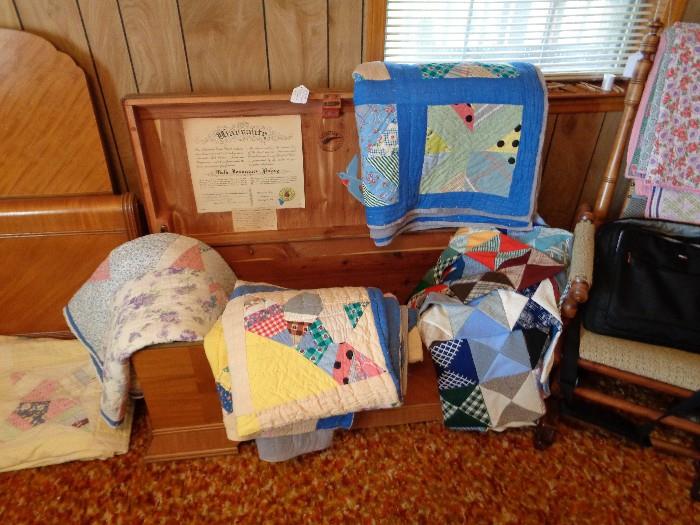 We have a nice collection of quilts, and even a nice cedar chest to store them hand, Chest by Dillingham. 