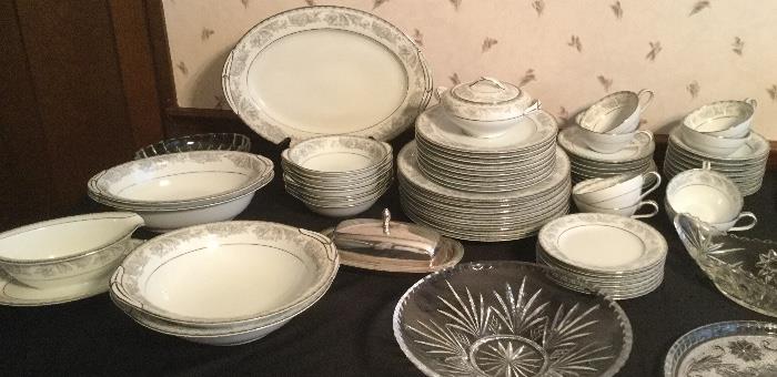 Noritake China, Service for Eight. Off-White with Silver and Aqua Accents.