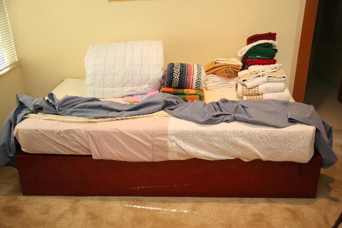 Red trundle bed has been sold. Items on the bed are still available for purchase.