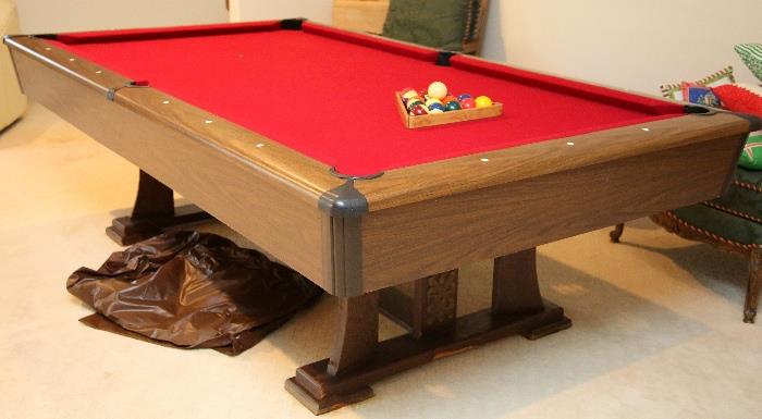 Pool table measures 30" H x 56" W x 101" L