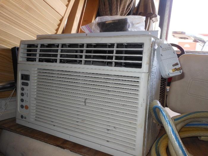 Air conditioner, LG small window unit.