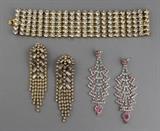 Lot 1021: RHINESTONE BRACELET AND TWO PAIRS OF CHANDELIER EARRINGS http://www.invaluable.com/auction-lot/rhinestone-bracelet-and-two-pairs-of-chandelier-e-1021-c-6ba4a7999c