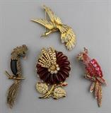 Lot 1033: JBK FLORAL BROOCH WITH A MARCASITE COCKATIEL BIRD BROOCH, RHINESTONE PARROT AND A RHINESTONE SWAN IN FLIGHT http://www.invaluable.com/auction-lot/jbk-floral-brooch-with-a-marcasite-cockatiel-bird-1033-c-7e34003a7a