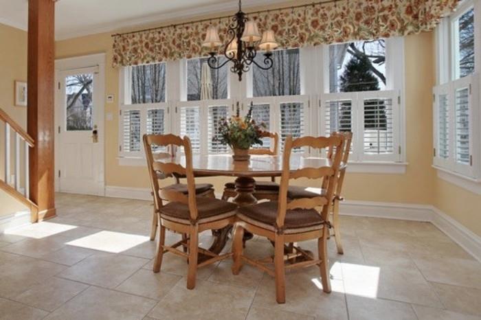 Antique French 60" Round Table with 8 chairs.