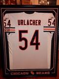 Signed Urlacher Jersey in a Beautiful Double Matted Frame.