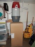 Brand New, unused NuTone central vac in box. Same unit as the one hanging on wall.