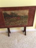 Folding table with hunt scene