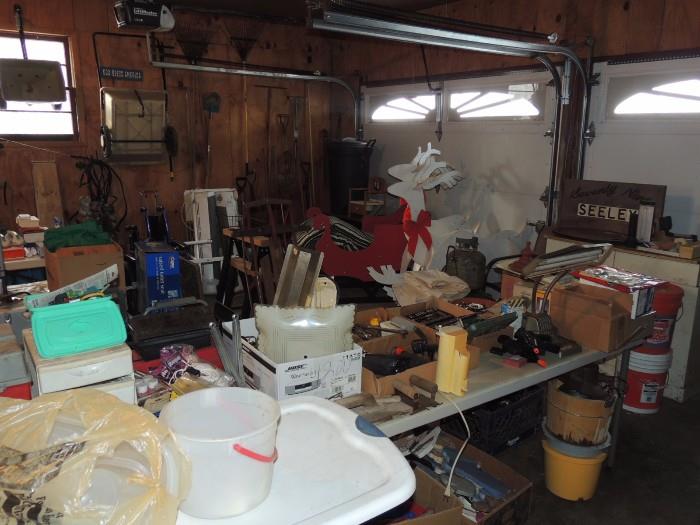 Garage full, tools, handmade seasonal yard decorations, medical supplies, including wheel chairs...