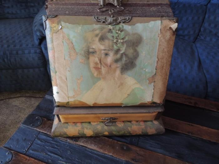 antique photo album on stand with one drawer