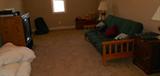 Television, Futon, Cedar Chest. Night Stands.