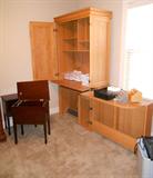 Armoire opens to desk and credenza. Also other file drawer tables, shredder, office supplies.