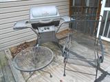 Charbroil Gas Grill Out door Wrought Iron Chair and side table matches the Glidder shown in the other picture.