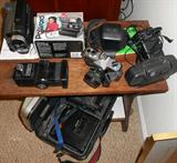 Cameras, Bell & Howell Auto load, Video transfer system, JVC Compact VHS, Vivitar Flash, Fuji f55 mm, Fujica Camera, Sony CCD, etc. More in closet.