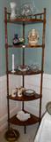 Tall, heavier than you would think, corner shelf.  Antique.