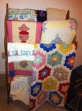 A few quilts in the attic areas, and older (not ideal condition) ones are located in the trunk in the basement.