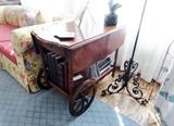 tantique tea cart, floral sofa , wrought iron lamp