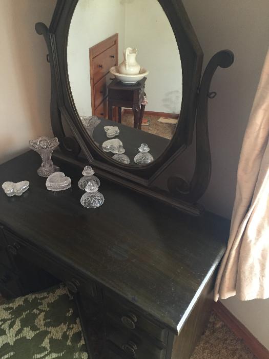 Antiqued mirror dressing table with matching chest of drawers