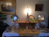 We have several Windberg's in this sale. This is a pretty one in top left corner, called Spanning The Spring Of Time. We have Heisey Crystal, A Vintage Ice Lip Heisey Pitcher, Pretty Cake Plates, Green Depression, Mayfair Pink Depression Glass and Other Nice Pieces On This Table.