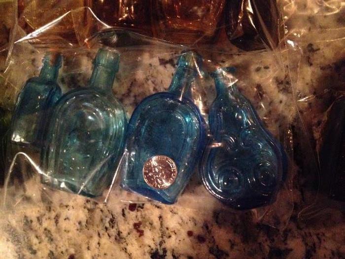 Blue horse shoe bottles